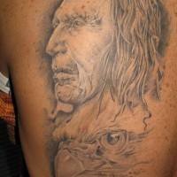 Indian and eagle heads tattoo on back