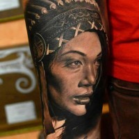 Indian girl tattoo on forearm