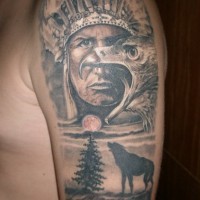 Indian with eagle and wolf tattoo on shoulder