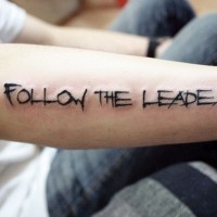 Interesting follow the leader quote tattoo on arm
