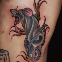 Large angry colorful rodent tattoo on side