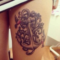 Lovely anchor with ornate elements and birds tattoo on thigh