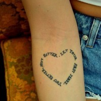 Lovely heart-shaped quote tattoo for girls on arm