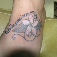 Lovely jasmine flower with quote tattoo on foot