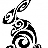 Marvelous black tribal hare with swirly print tattoo design
