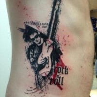 Medium size colored trash polka side tattoo of rock musician with lettering