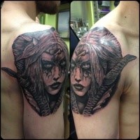 Old looking detailed upper arm tattoo of woman monster with cross