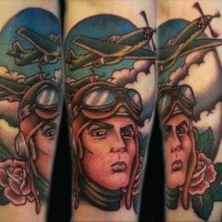 Old school style colored pilot portrait tattoo stylized with plaes and roses