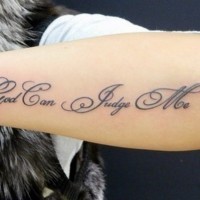 Only God can judge me quote tattoo on arm