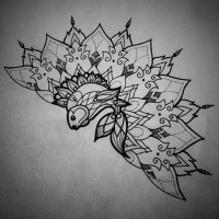 Ornate-fined fish and half-mandala tattoo design