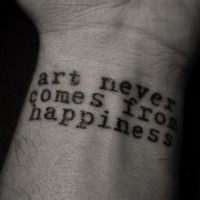 Print-lettered art neved comes from happiness quote tattoo on arm