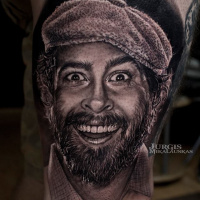 Realistic Jason Lee portrait tattoo
