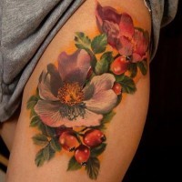 Realistic colorful flowers tattoo on thigh