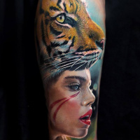 Realistic girl and tiger tattoo on arm3
