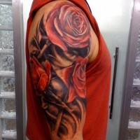 Realistic red rose flowers tattoo for men on upper arm