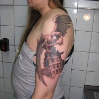 Revengeful angel warrior with blodded sword tattoo on shoulder