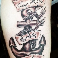 Roped anchor with lettering tattoo on shin