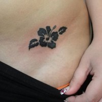 Simple tiny black hibiscus flower tattoo for girls on side