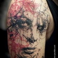 Sketch style colored upper arm tattoo of woman portrait combined iwth various ornaments