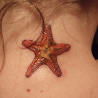 Small cool orange starfish tattoo on neck