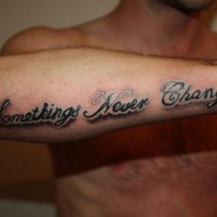 Something never change quote tattoo on arm