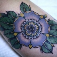 Tender traditional violet flower tattoo on arm