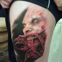 Terrifying colored horror thigh tattoo of evil vampire portrait