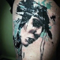 Trash polka style colored thigh tattoo of woman face with symbols
