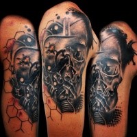 Trash polka style colored upper arm tattoo of pilot skull