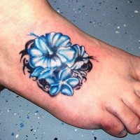 Tribal blue hawaiian hibiscus flower tattoo on foot