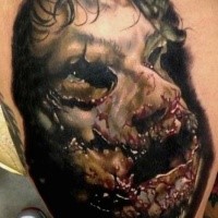 Unbelievable very detailed tattoo of bloody mask