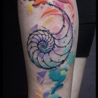 Unfinished multicolored leg tattoo of nautilus with flames