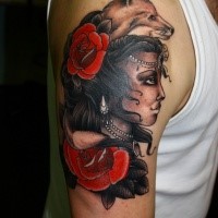 New school style colored shoulder tattoo of gypsy woman with flowers