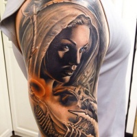 New school style colored shoulder tattoo of beautiful woman with blue eyes