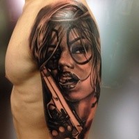 New school style colored shoulder tattoo of sexy clown woman with pistol