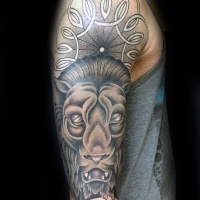Usual old school style upper arm tattoo of gargoyle statue combiend with ornamental flower