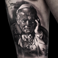 Very realistic looking Pope portrait tattoo