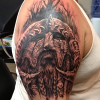 Viking warrior head tattoo on shoulder