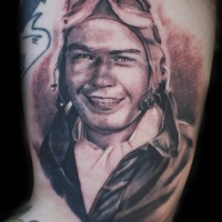 Vintage like colored tattoo of smiling pilot portrait