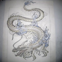 Wonderful blue-color ice dragon tattoo design - Tattooimages.biz