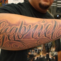 Wonderful name quote tattoo for men on arm
