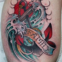 Wonderful old school anchor in waves with family lettering tattoo on shin
