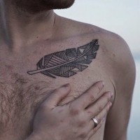 Abstract gray-ink tribal feather tattoos for men on chest