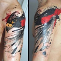 Abstract painted colored shoulder tattoo of eagle