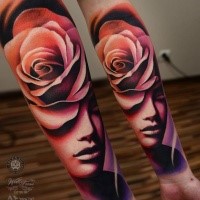 Abstract style accurate looking colored thigh tattoo of woman with pink rose
