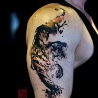 Abstract style black and white big shoulder tattoo of running tiger
