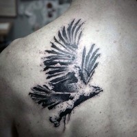 Abstract style black and white eagle tattoo on scapular