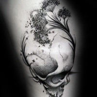 Abstract style black and white human skull with plants tattoo