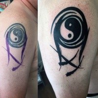 Abstract style black ink shoulder tattoo of Yin Yang symbol