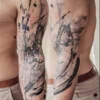 Abstract style black ink sleeve tattoo of various ornaments